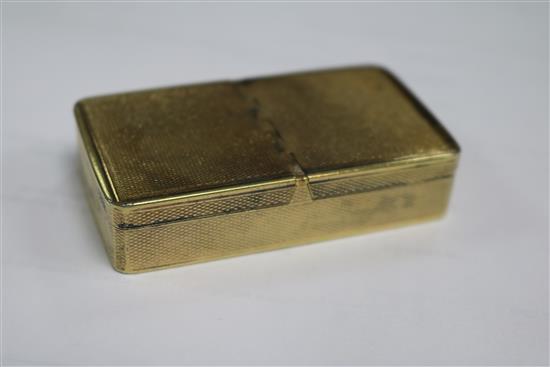 A George IV engine turned silver gilt double lidded snuff box by John Linnit, London, 1822, 71mm.